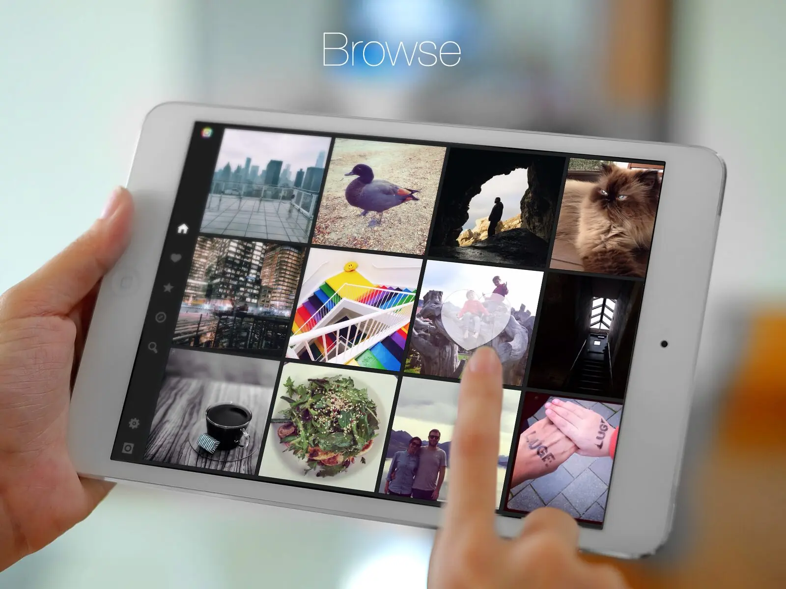 Hands holding an iPad running Flow, a grid of Instagram photos