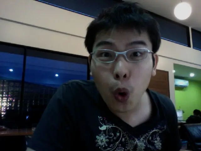A team member pulling a face at the webcam