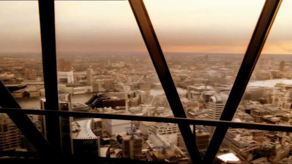 London at dusk through the Gherkin’s steel frame